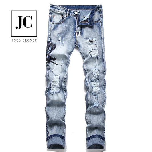 Ice Blue Cobra Embroidered & Distressed Jeans